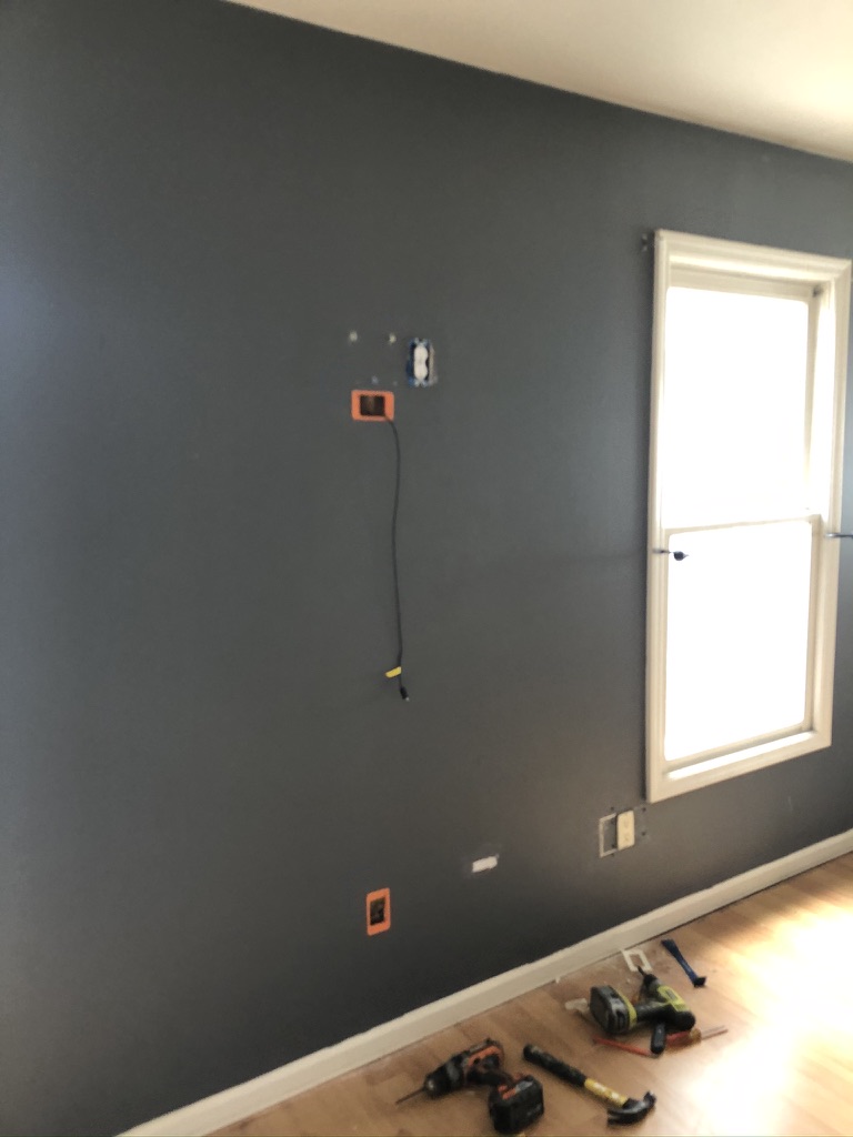 Wall before fireplace feature